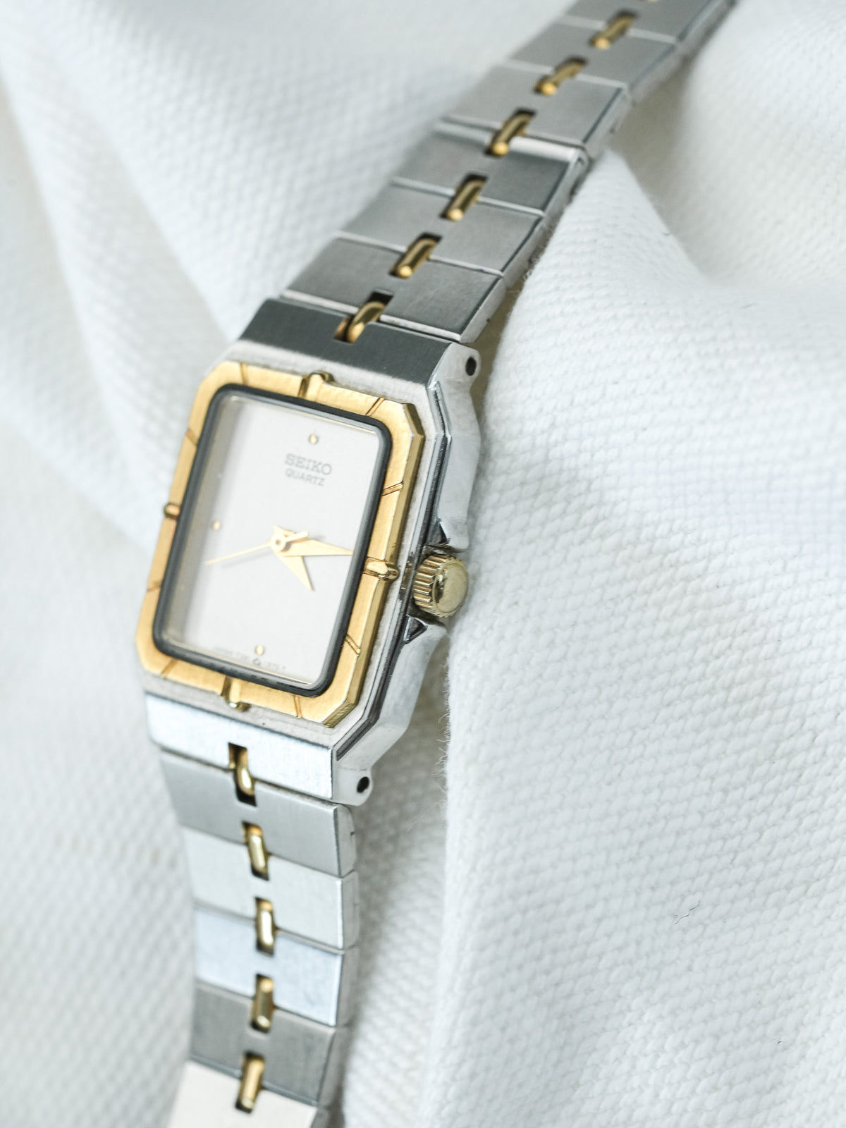 Seiko Quartz vintage watch with two-tone steel and gold bracelet, white dial