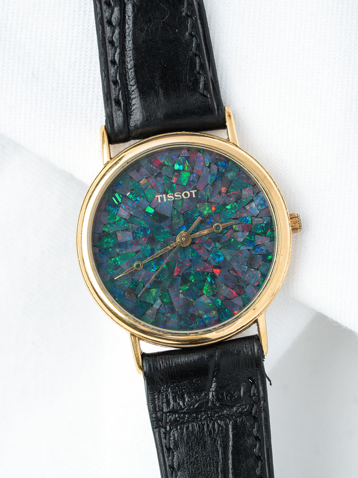 Tissot vintage watch with opal mosaic dial, gold case, black leather strap