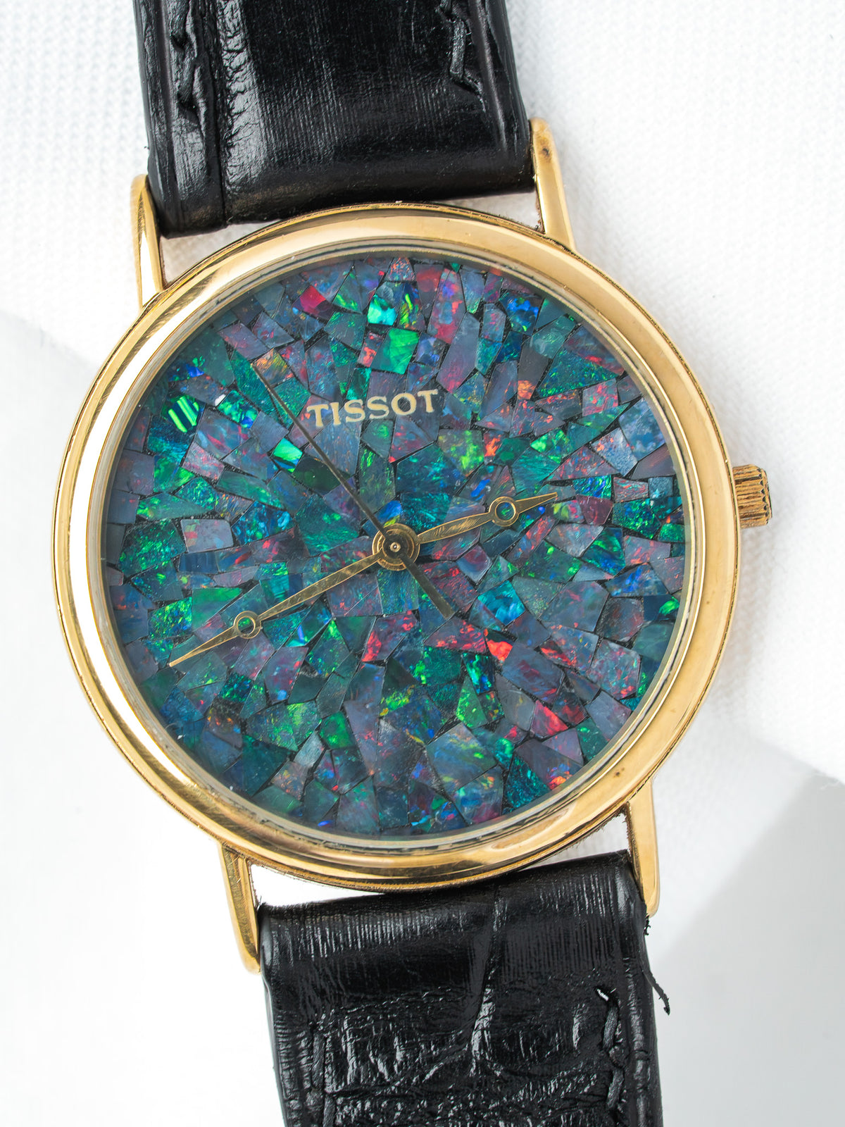 Tissot vintage watch with opal mosaic dial, gold case, black leather strap
