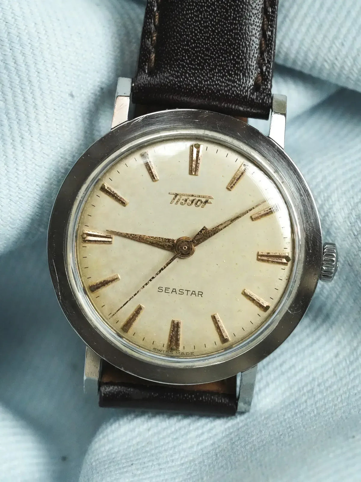 Tissot Seastar vintage watch with cream dial, gold markers, steel case, brown leather strap