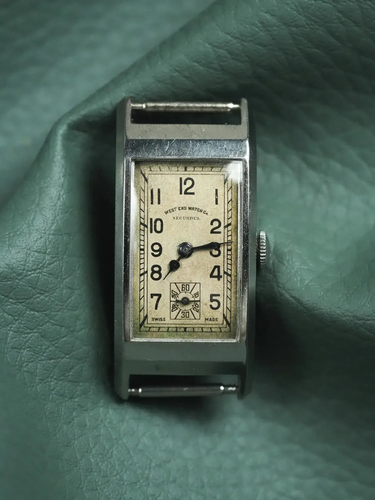 Vintage West End Watch Co. Secundus rectangular watch with cream dial on green leather