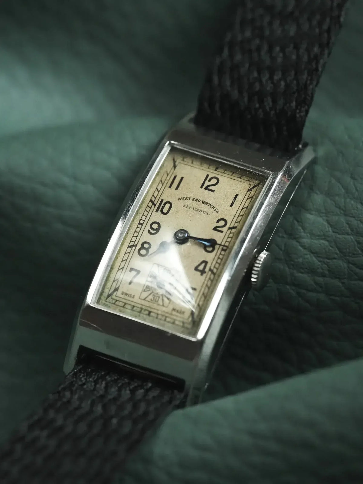Vintage West End Watch Co. Secundus rectangular watch with cream dial and black fabric strap