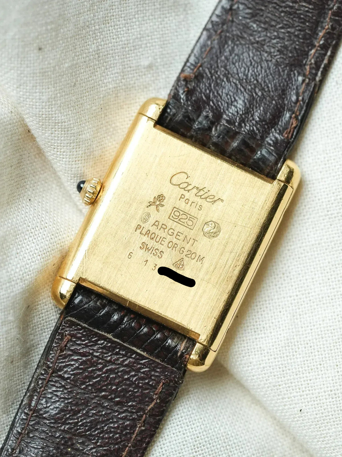 Cartier vintage watch back, gold case with engraved details, brown leather strap