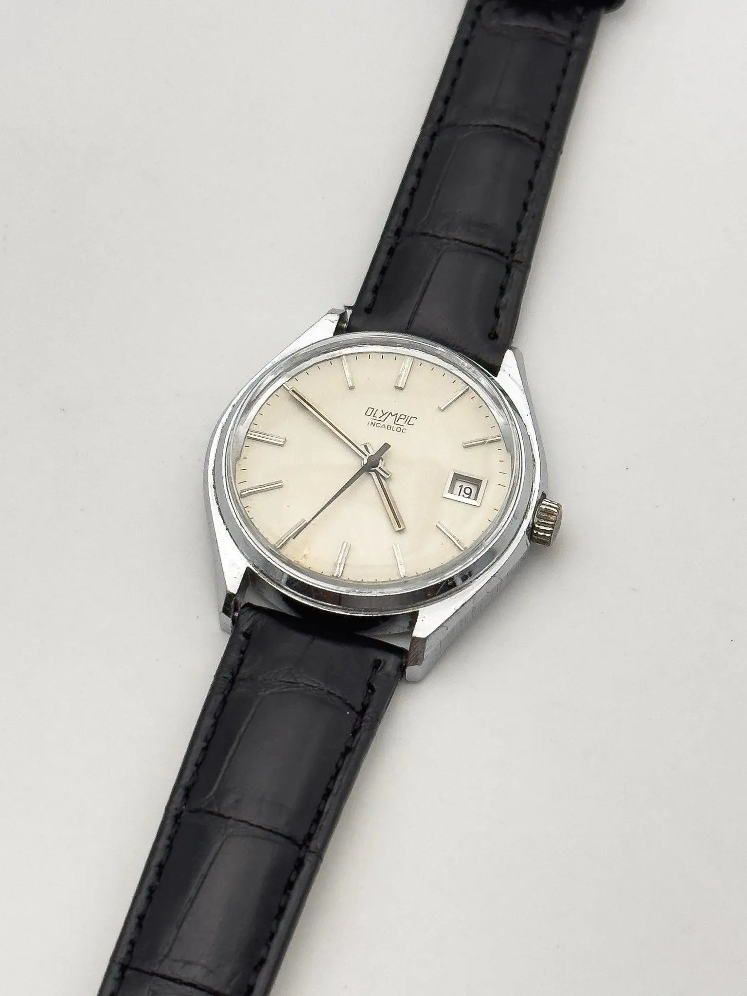 Olympic - Incabloc Date Cream - 1970s - Atelier Victor Paris - Vintage Watch Shop Dubai