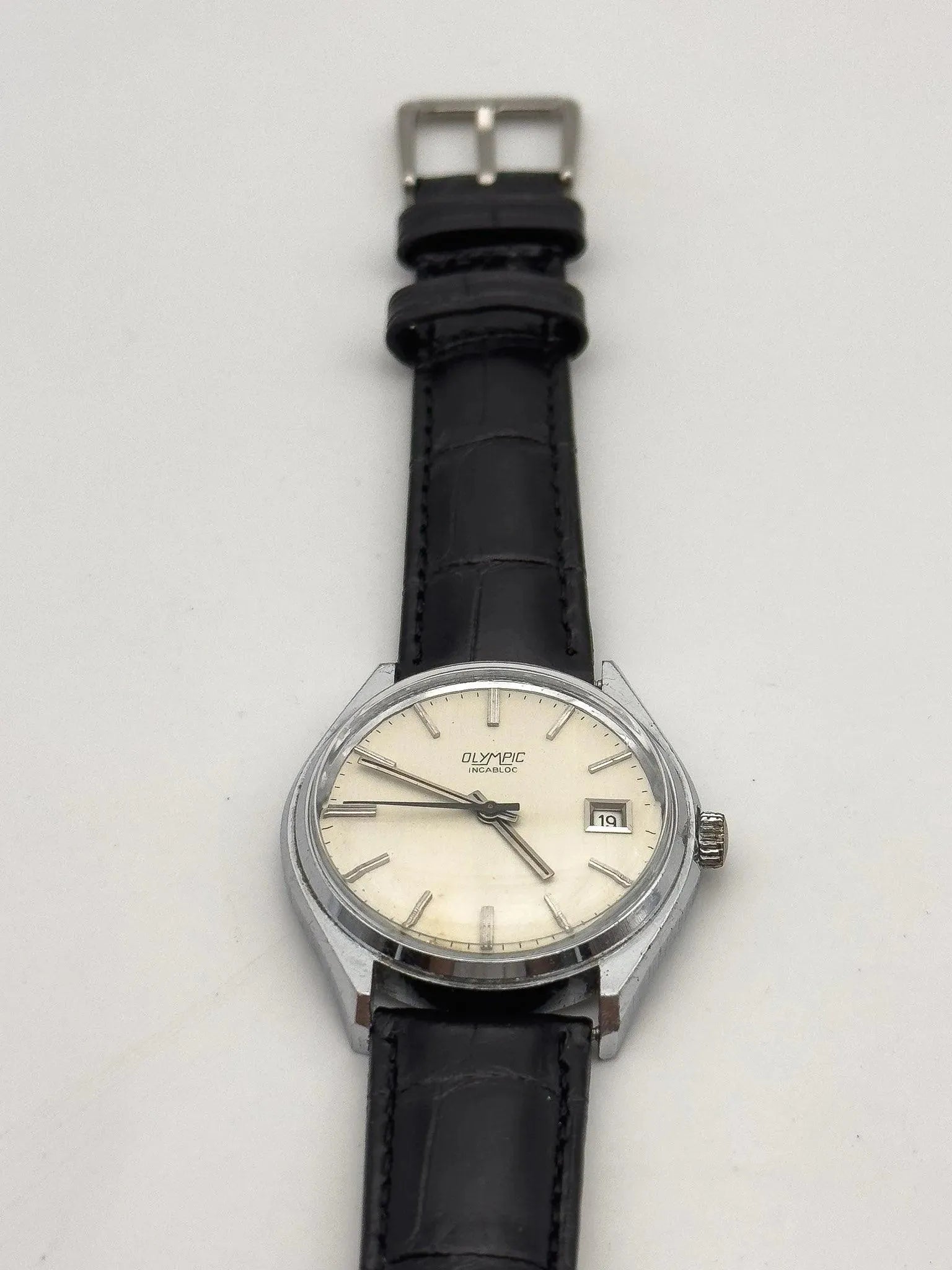 Olympic - Incabloc Date Cream - 1970s - Atelier Victor Paris - Vintage Watch Shop Dubai
