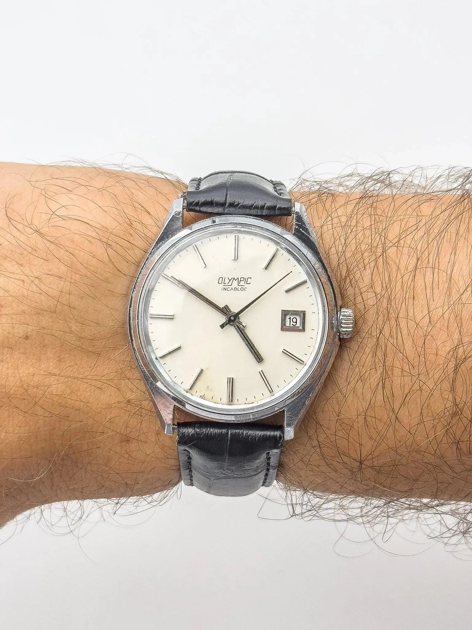 Olympic - Incabloc Date Cream - 1970s - Atelier Victor Paris - Vintage Watch Shop Dubai