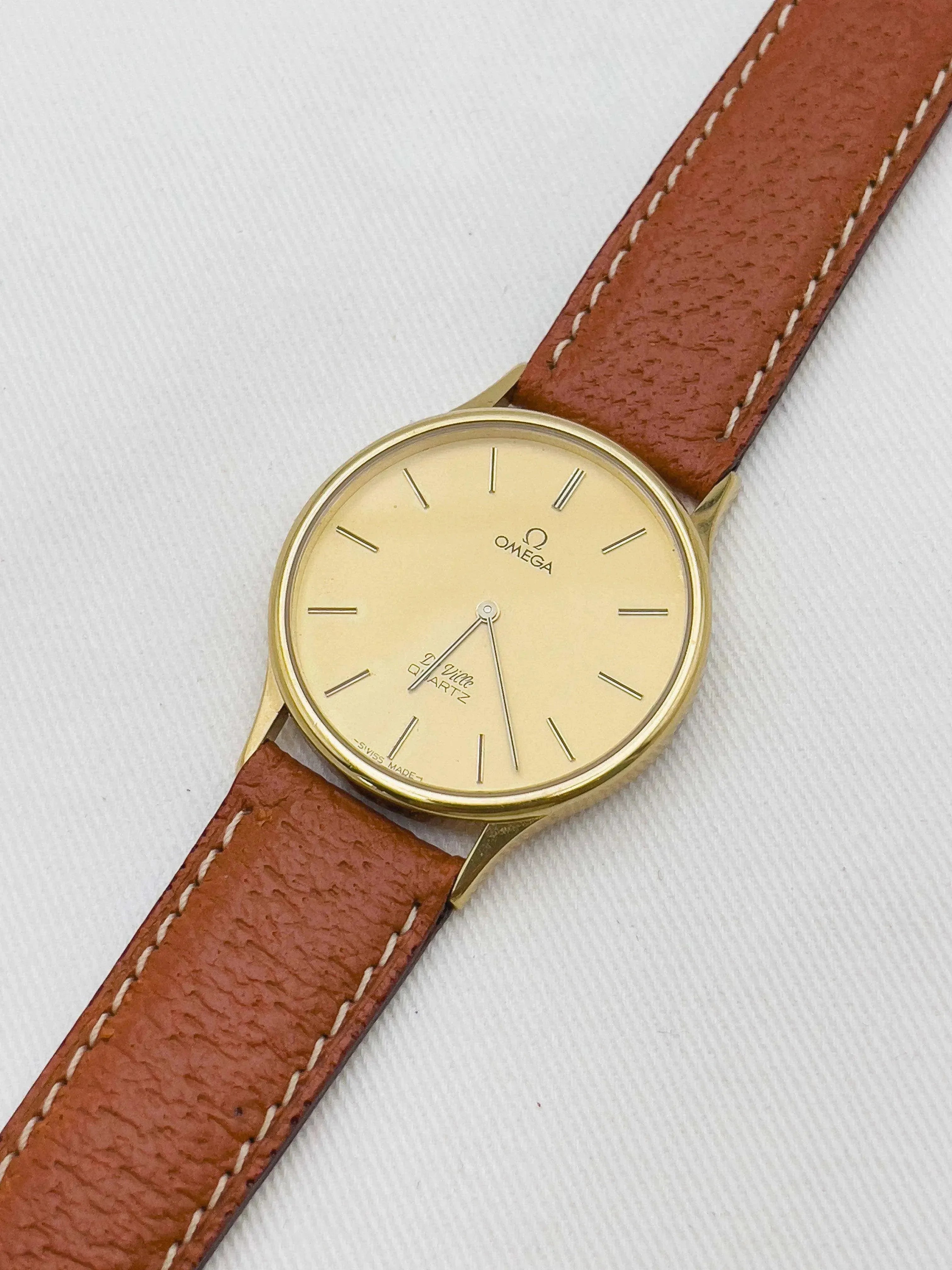 Omega - De Ville Gold Circle Poussoir Marron - 1980 - Atelier Victor - Vintage  Shop
