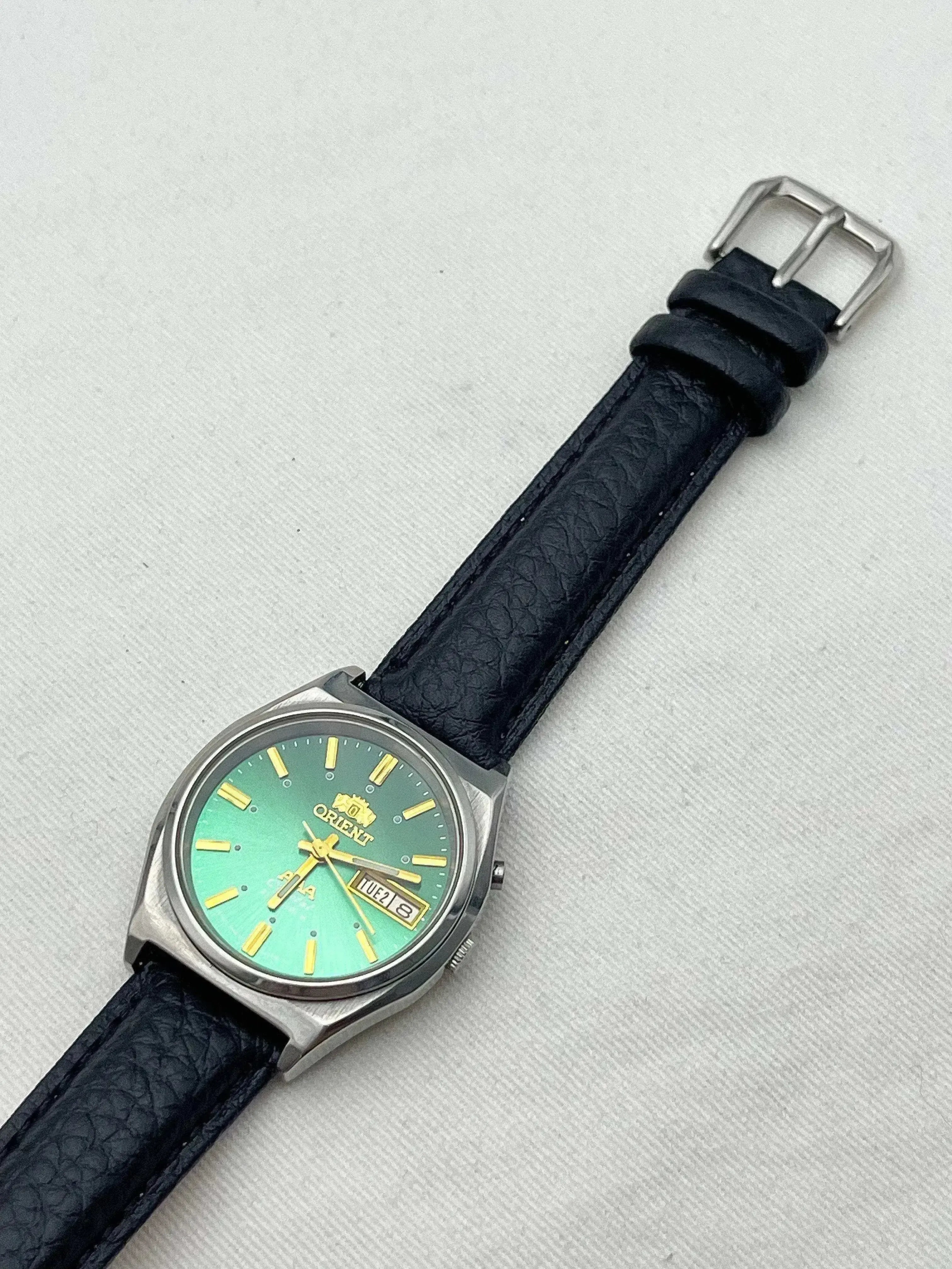 Orient - Acier Vert et index or- 1970s - Atelier Victor