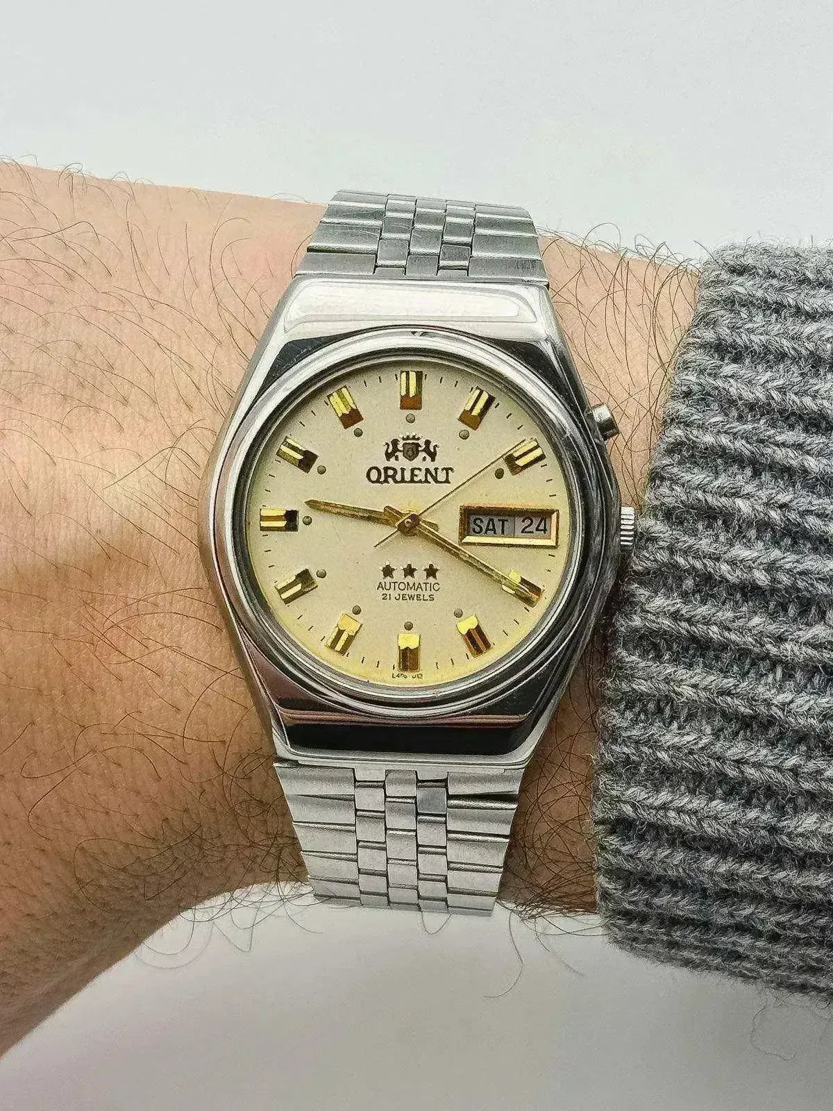 Orient - Daydate циферблат бежевый индекс золото - 1980s