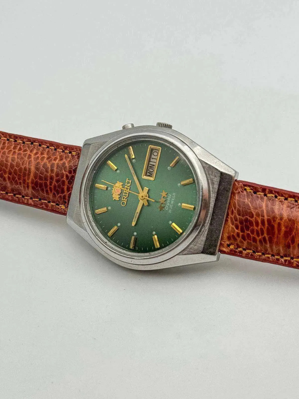Orient - Daydate Cadran Vert cuir marron - 1970s - Atelier Victor - Vintage  Shop