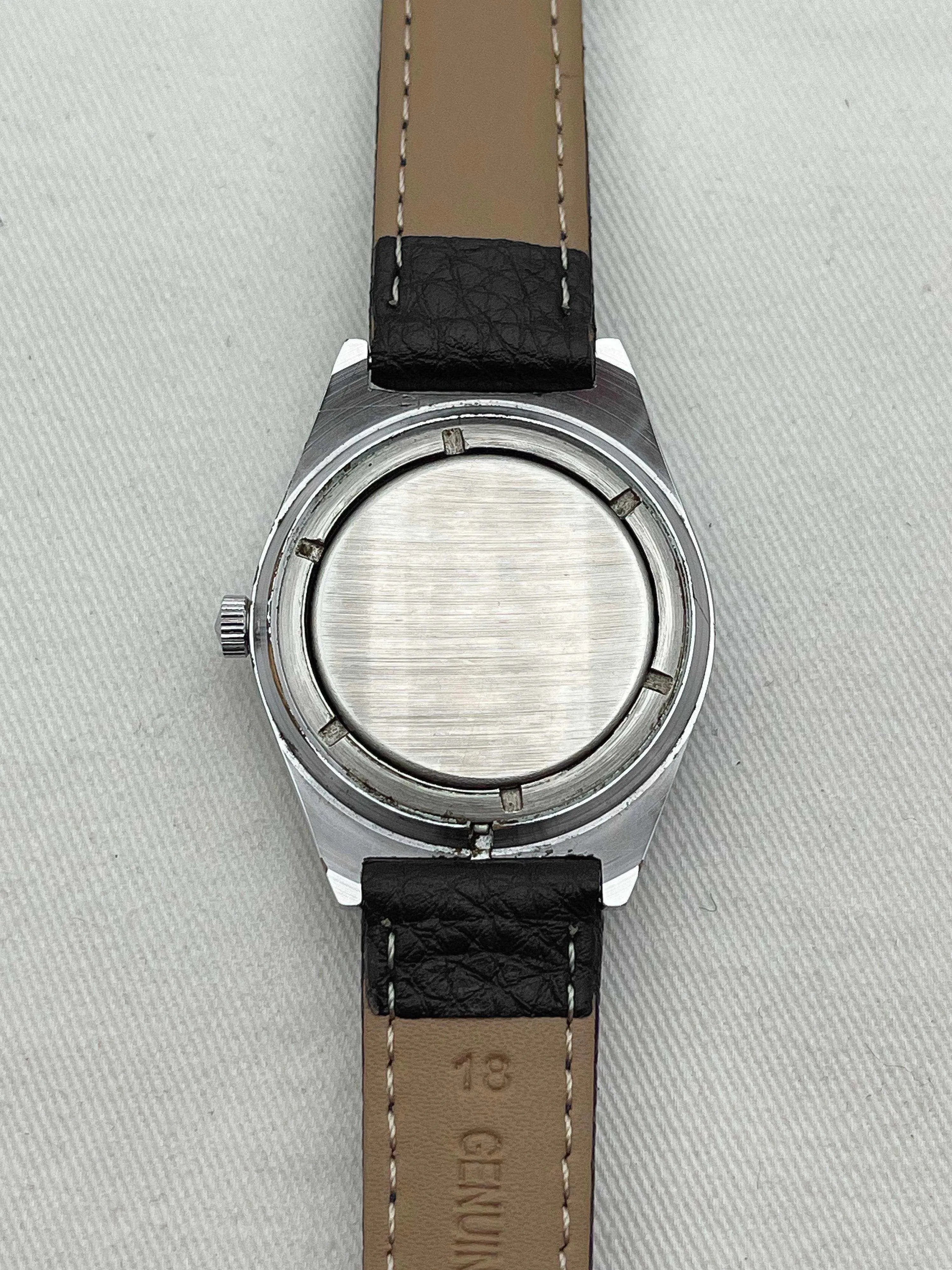 Raketa - Daydate Cream - 1970s - Atelier Victor Paris - Vintage Watch Shop Dubai