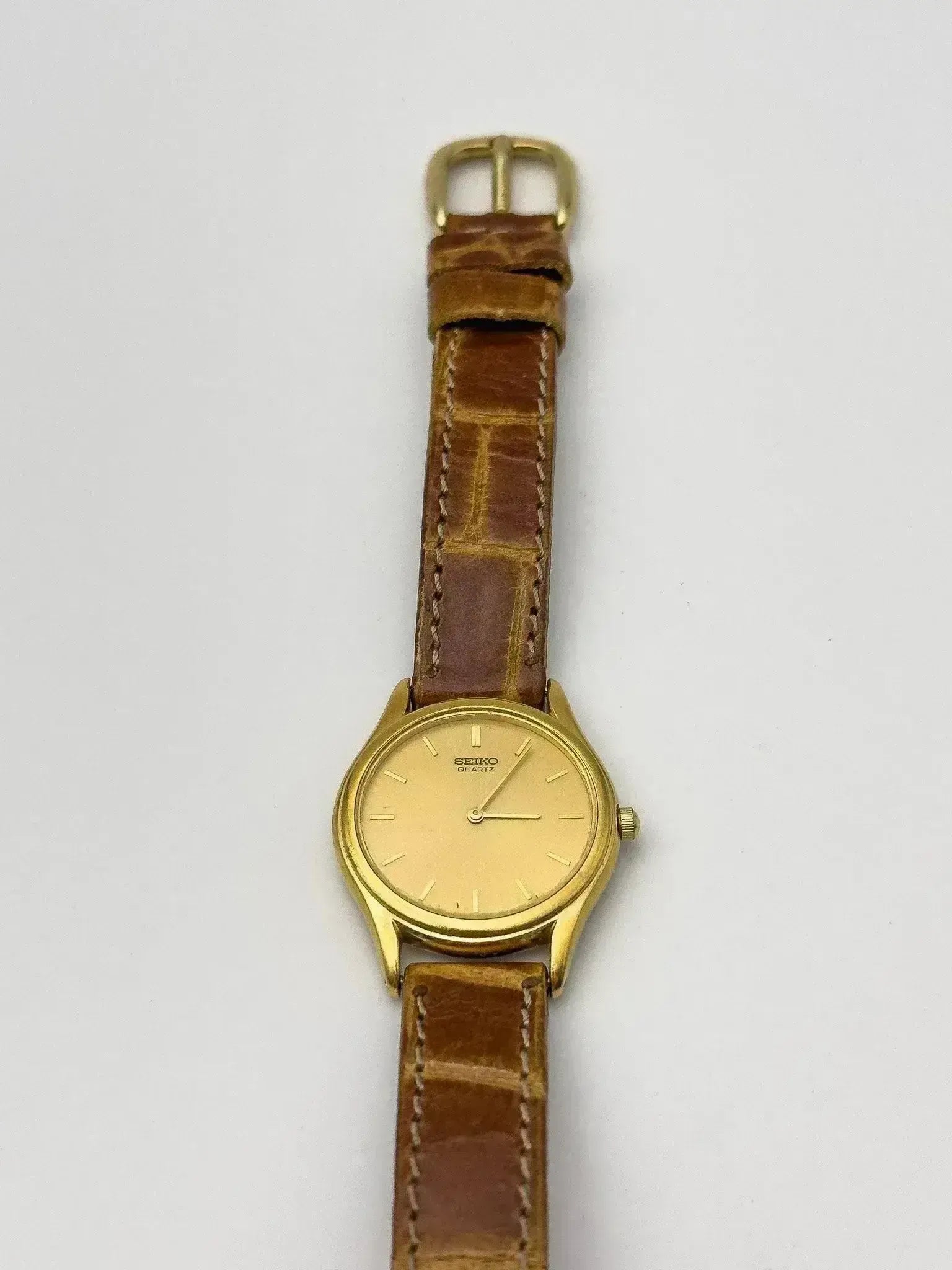 slim fit dress slacks Seiko - Mini Gold Dress Watch