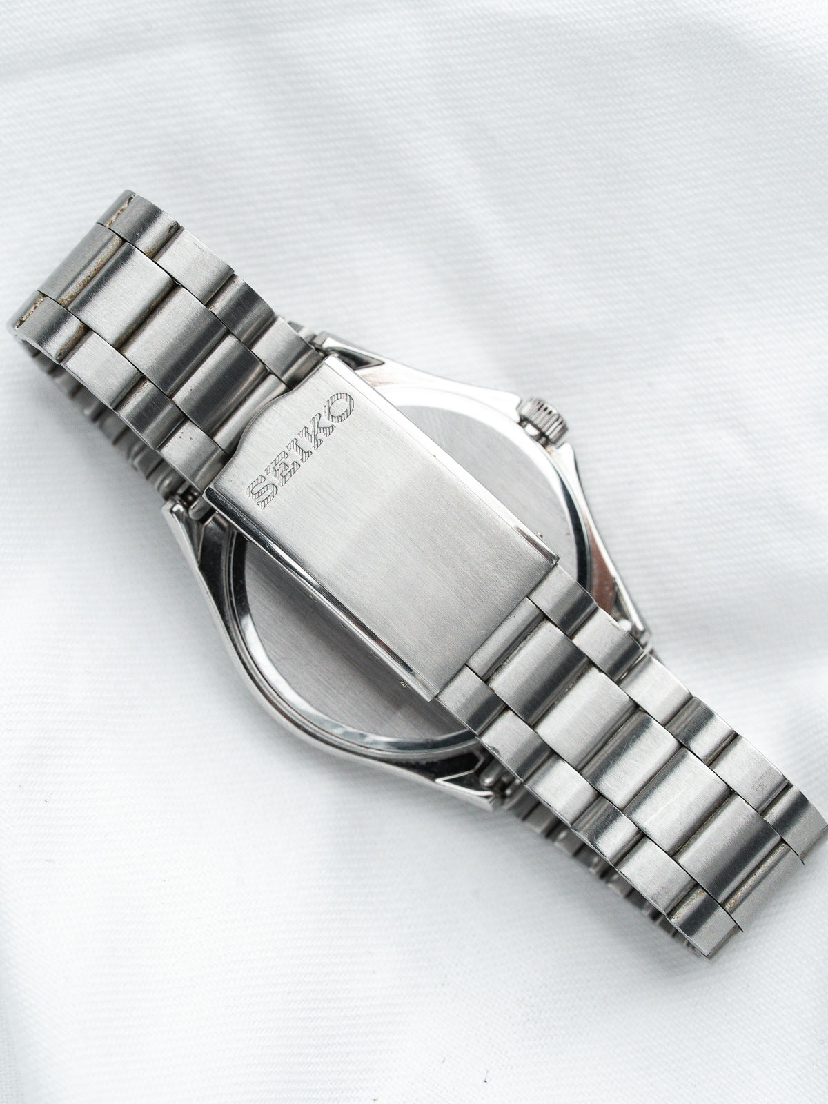 Seiko vintage watch with stainless steel bracelet and engraved case back
