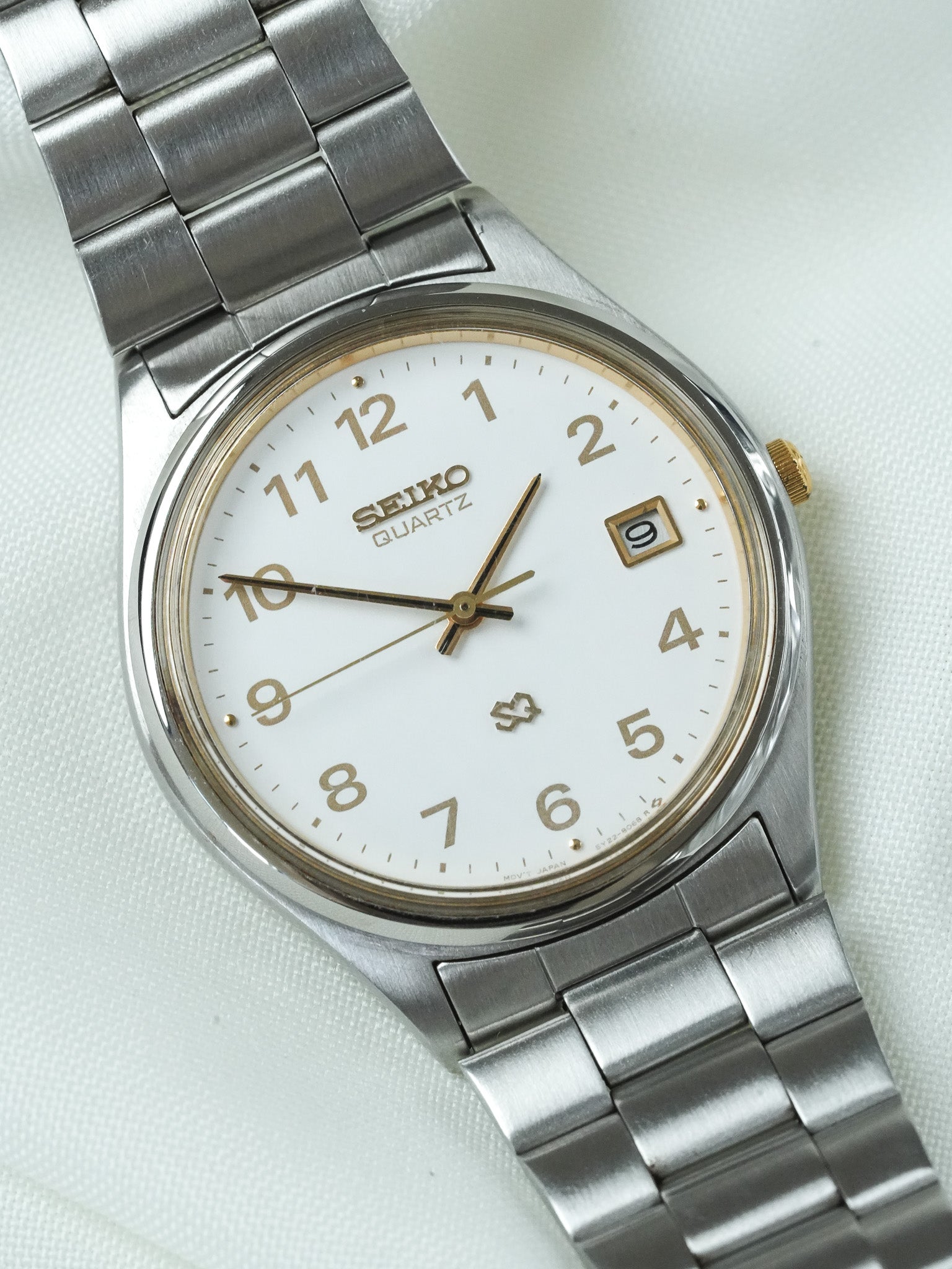 Seiko - SQ Redondo Acero Oro números arábigos fecha - 1988 