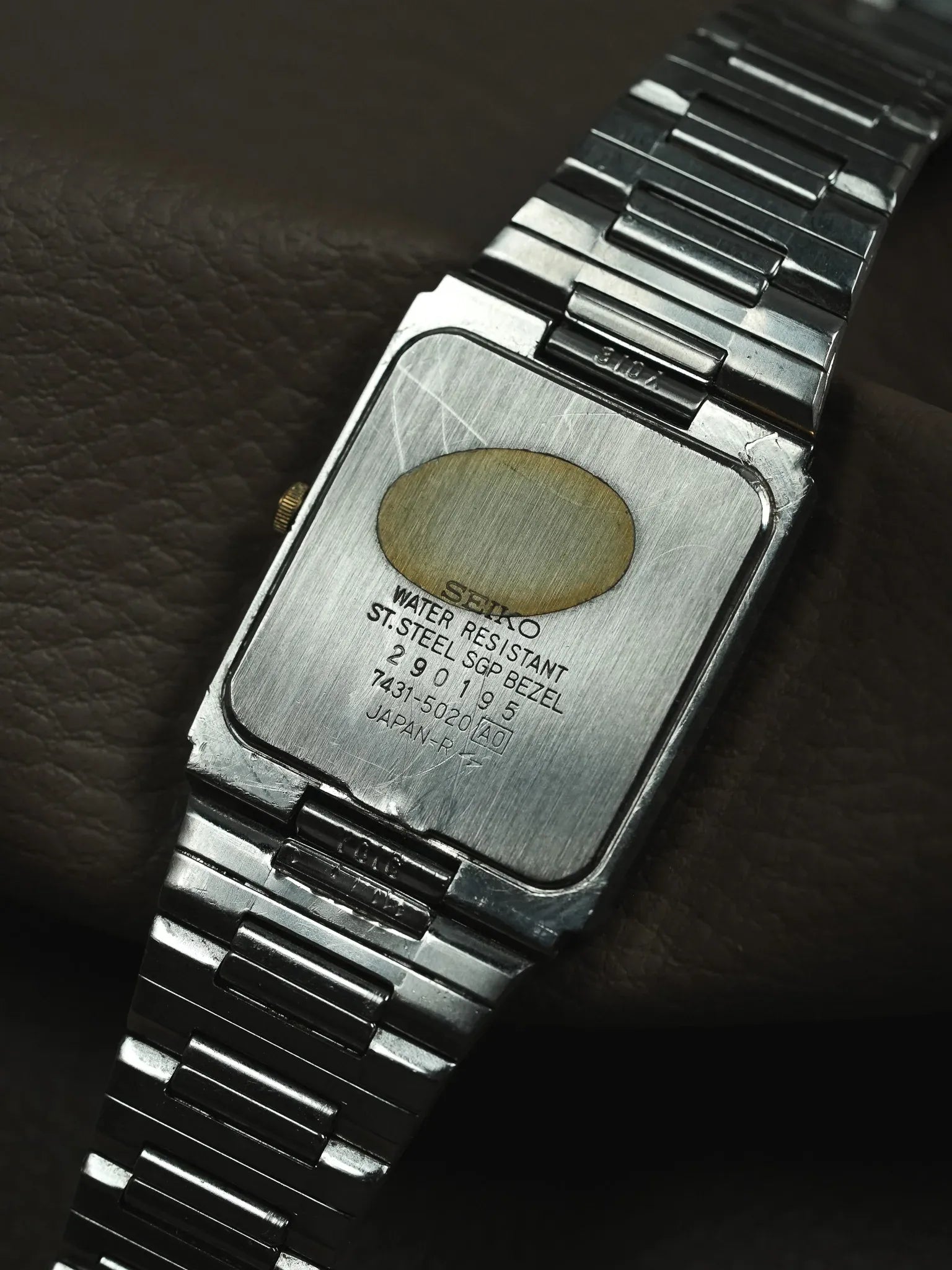 Seiko - Tank acier or lunette vissée cadran gris - 1982 - Atelier Victor