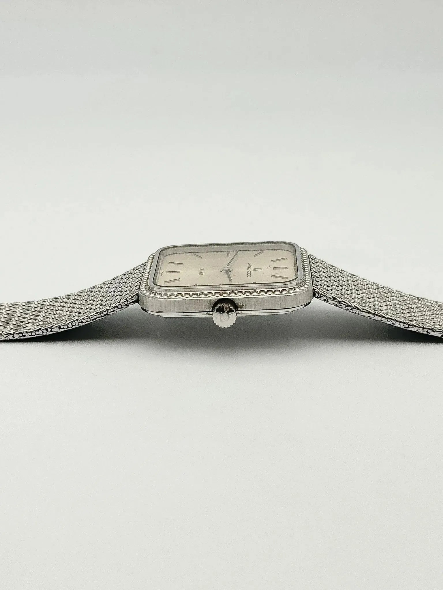 Universal Genève - Bracelet intégré Maille milanaise acier - 1980s - Atelier Victor - Vintage  Shop