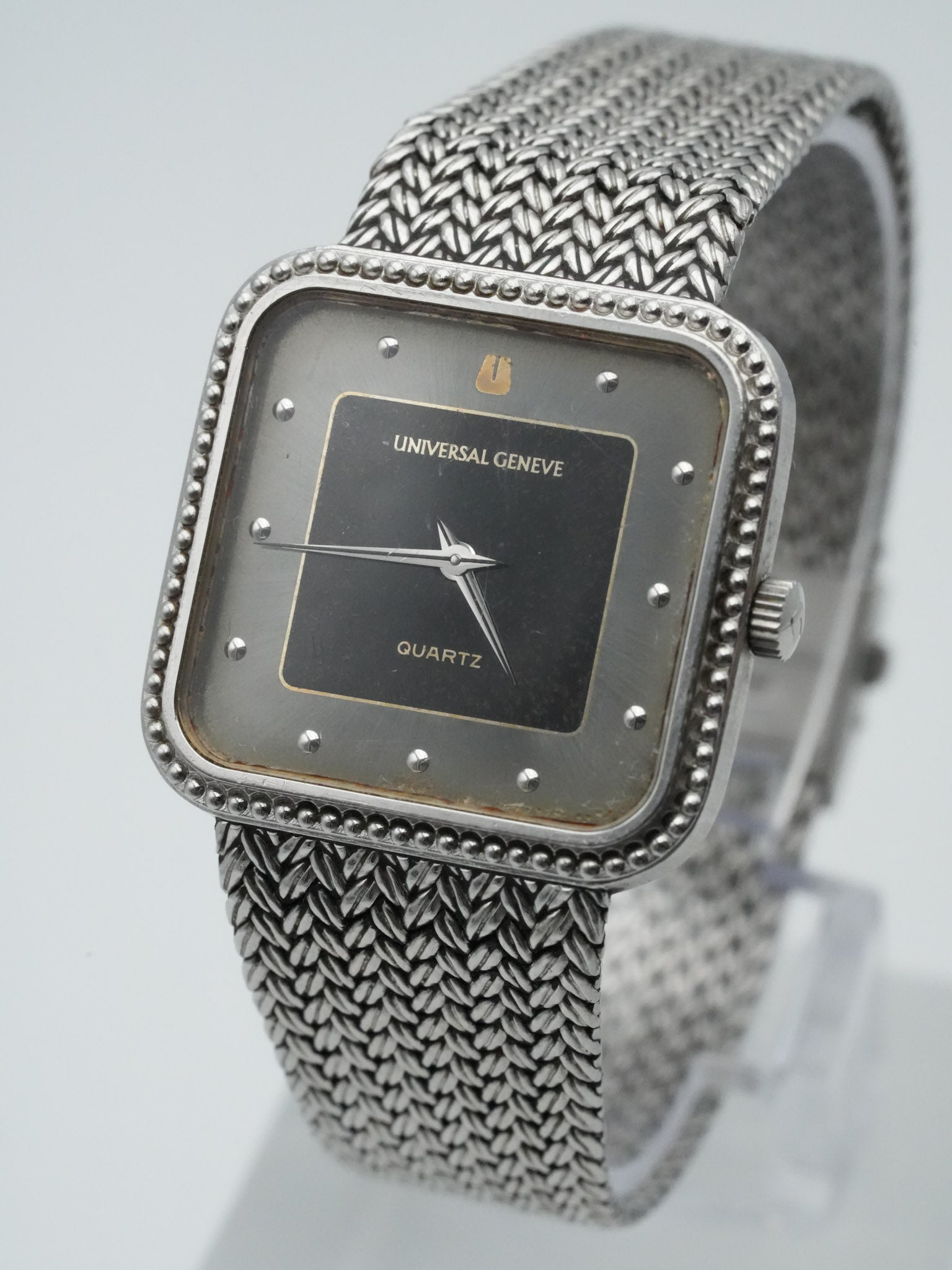 Universal Genève - Maille Acier Cadran Noir Patiné - 1980s - Atelier Victor Paris - Vintage Watch Shop Dubai