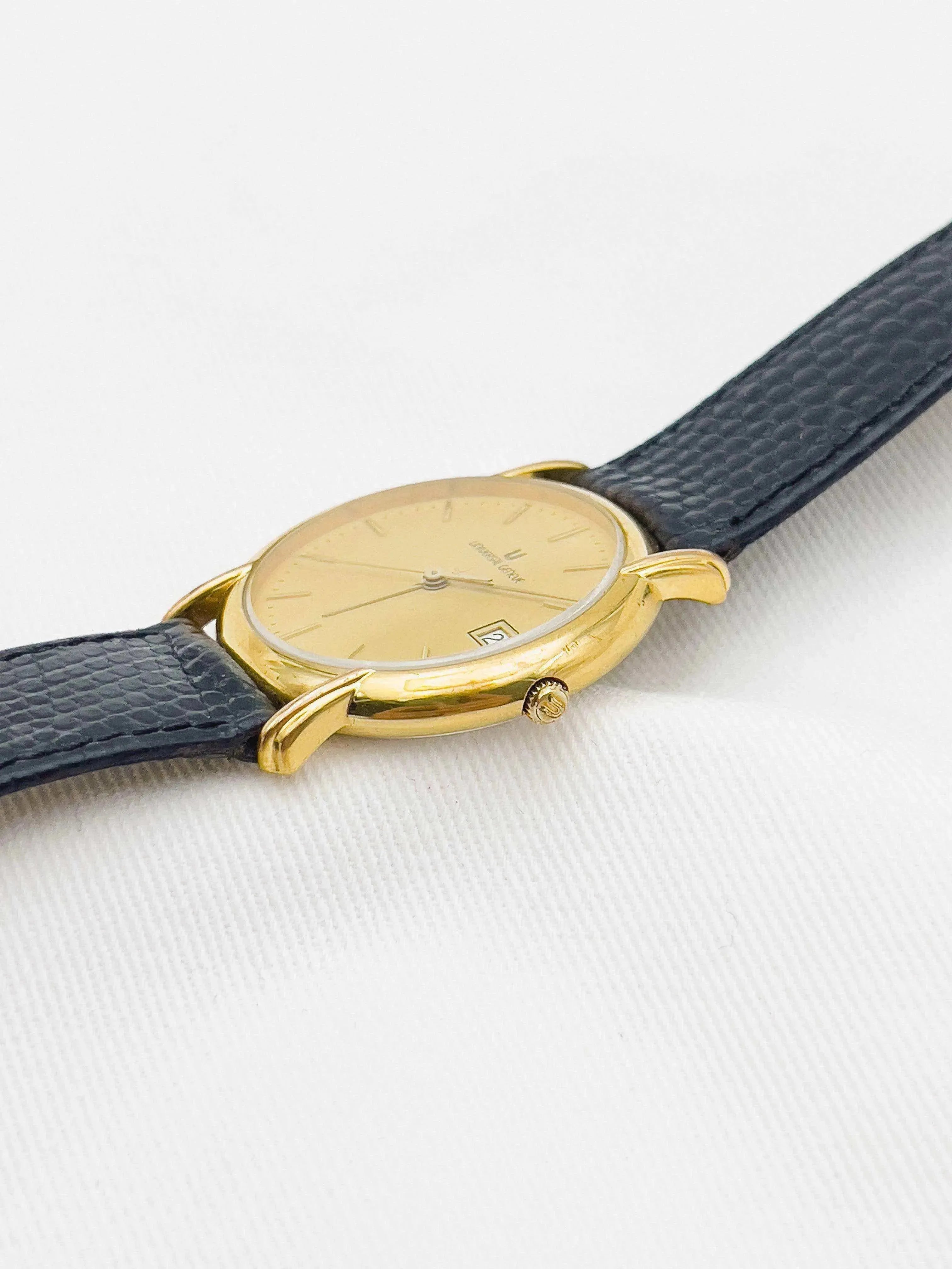 Universal Genève - Plaqué or Circle Date - 1970s - Atelier Victor Paris - Vintage Watch Shop Dubai