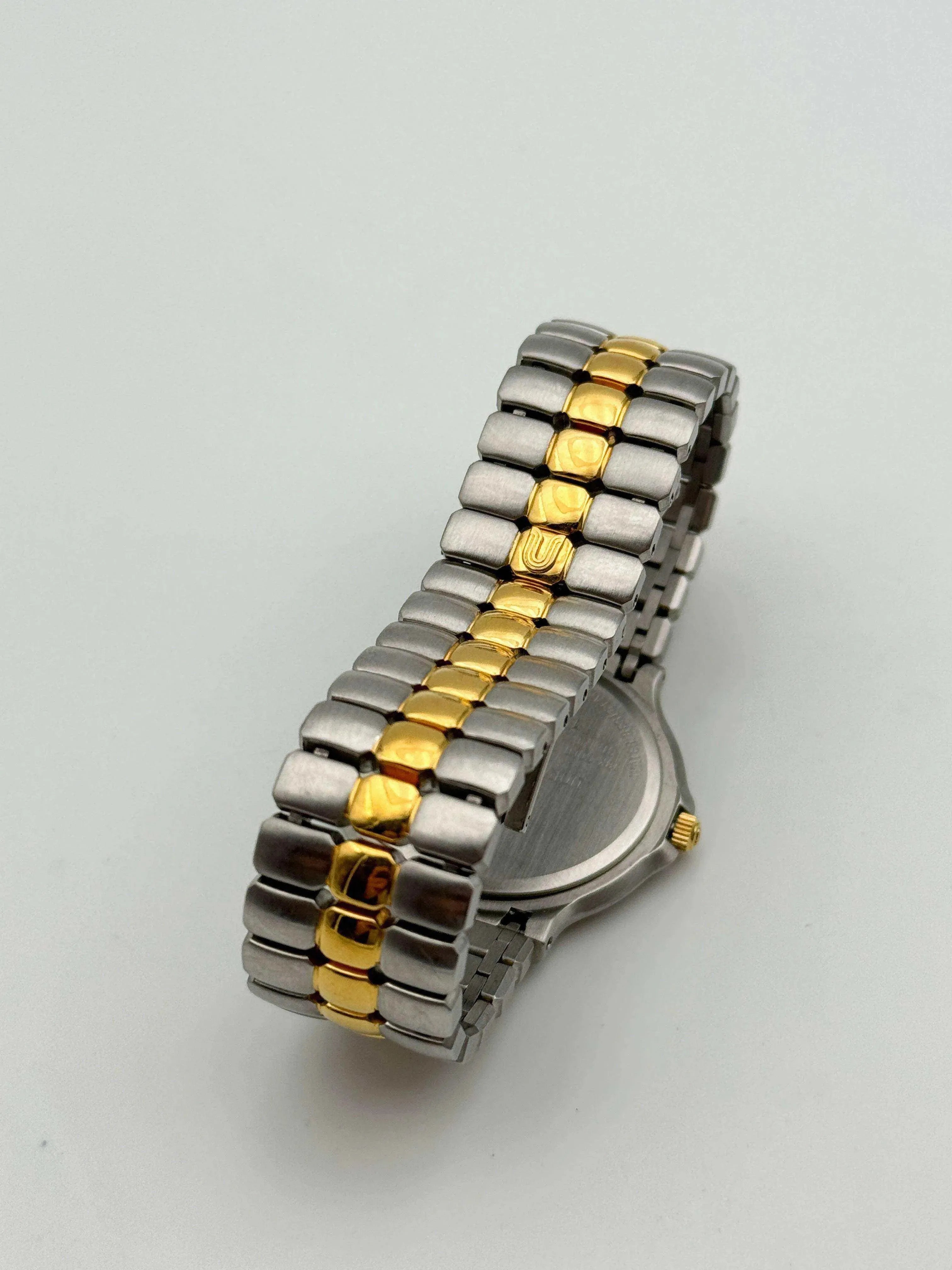 Universal Genève - Polerouter Gold & Steal Quartz - 1980s - Atelier Victor Paris - Vintage Watch Shop Dubai