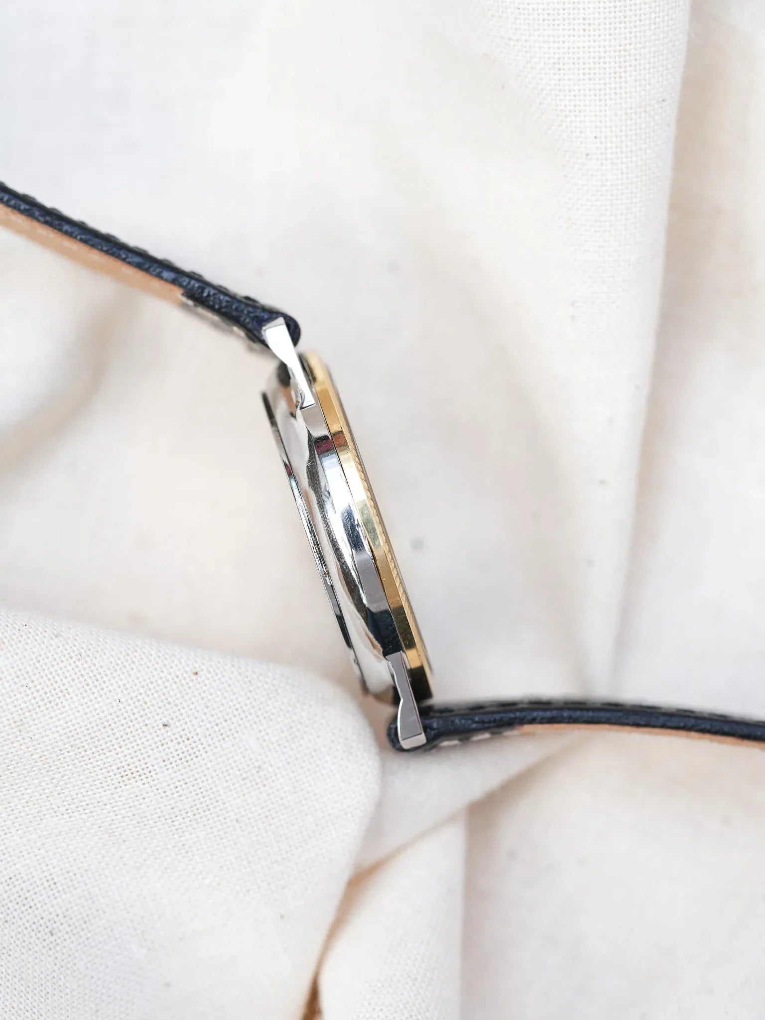 Universal Genève - Triple Calendar Phase de lune acier lunette guillochée or 18k - 1990s - Atelier Victor