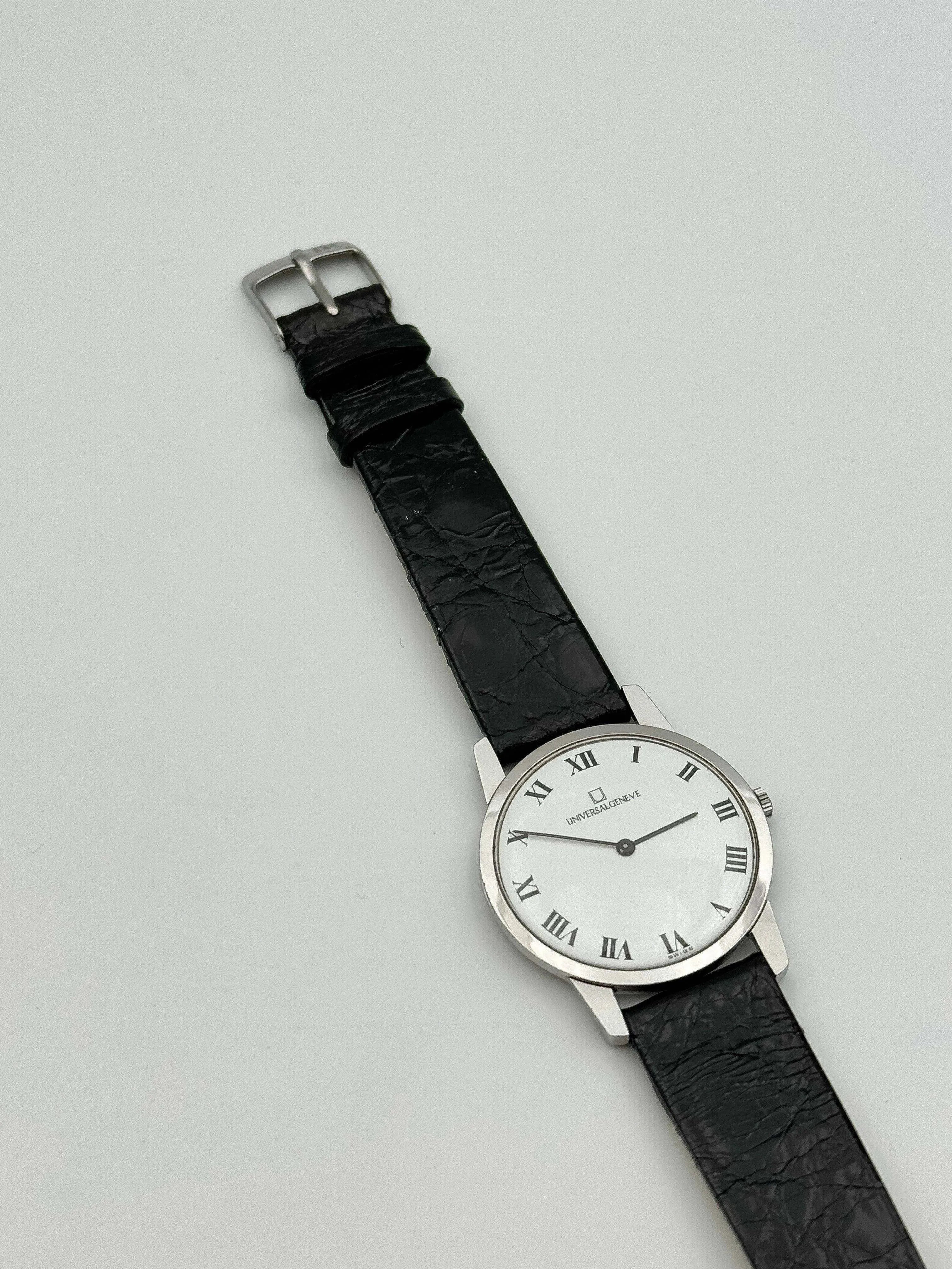 Universal Genève - Ultra plat Cadra Romain Cadran Blanc - 1970s - Atelier Victor Paris - Vintage Watch Shop Dubai