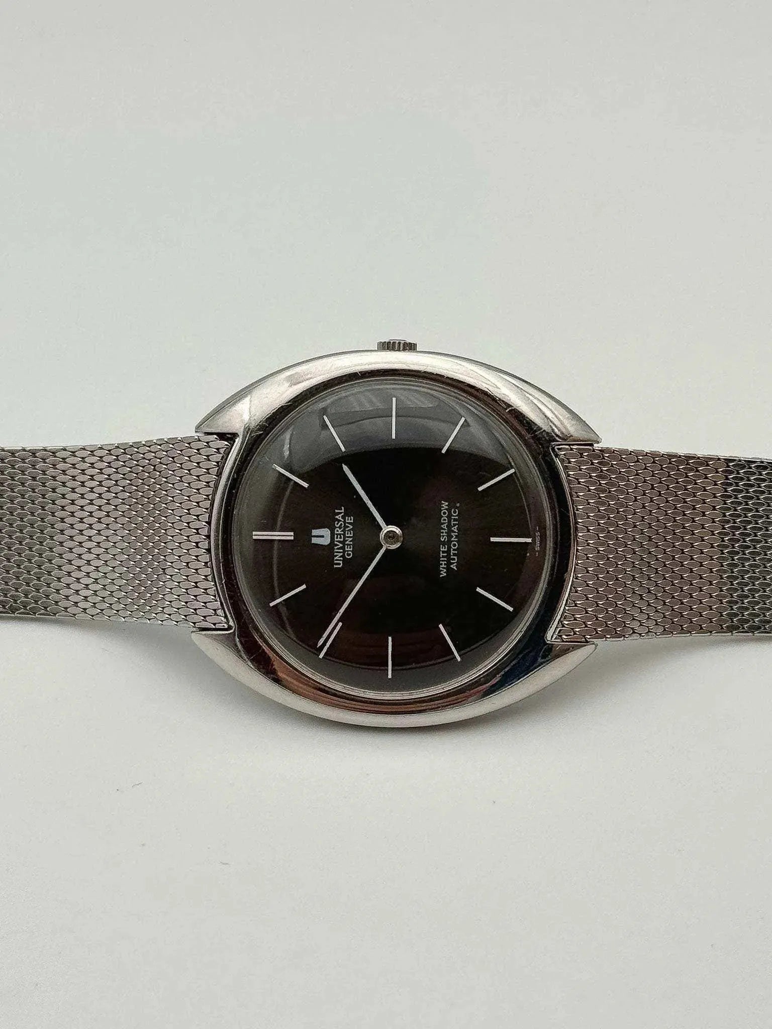 Universal Genève - White Shadow Black Full Steel - 1960s - Atelier Victor Paris - Vintage Watch Shop Dubai