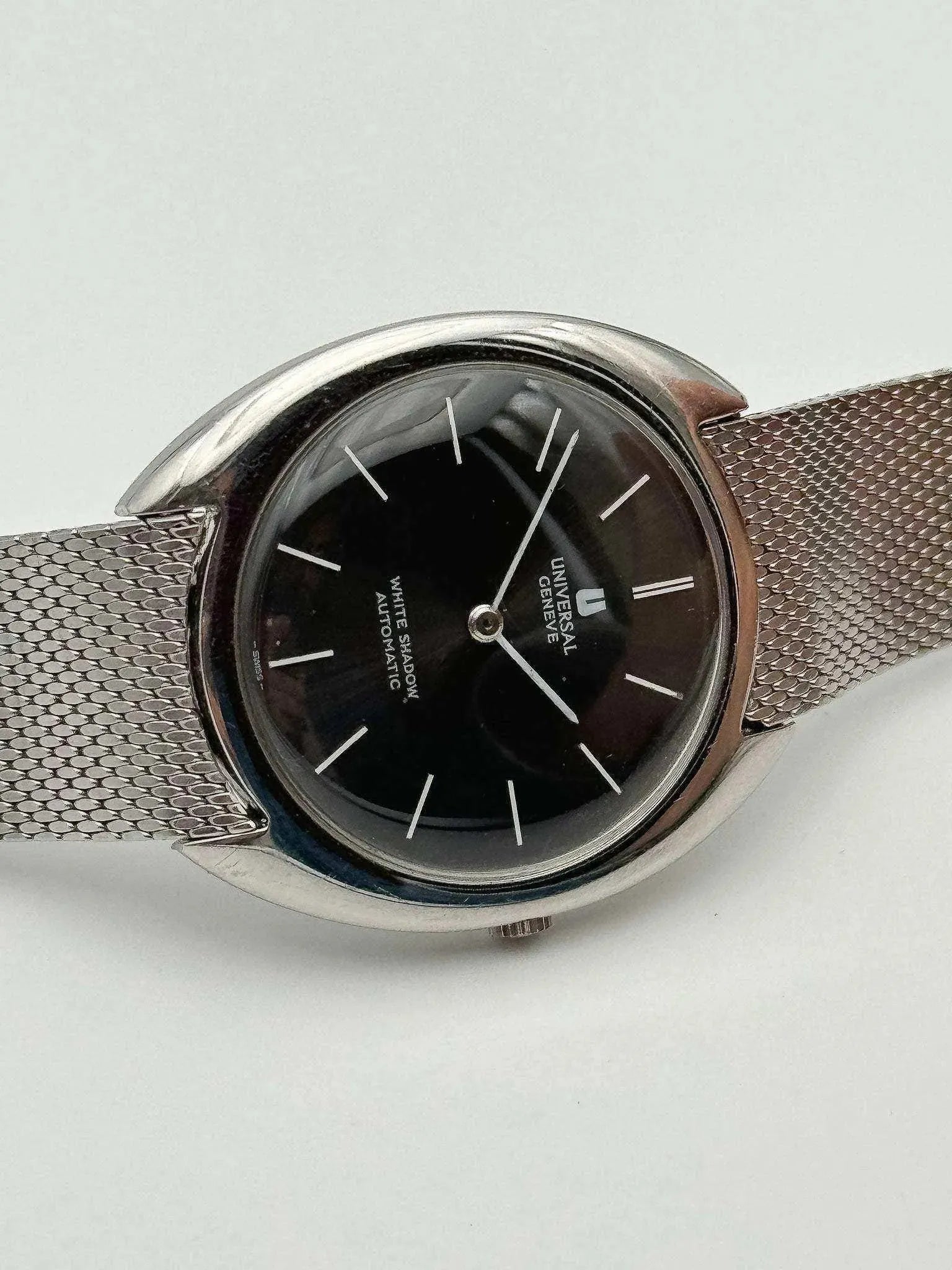 Universal Genève - White Shadow Black Full Steel - 1960s - Atelier Victor Paris - Vintage Watch Shop Dubai