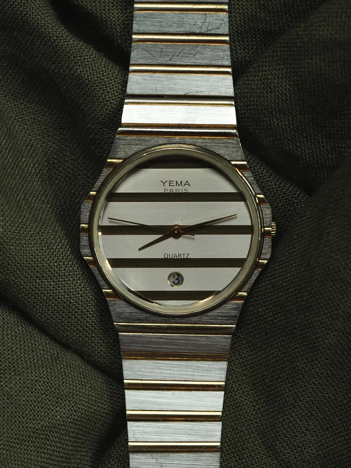 Yema Paris vintage quartz watch with striped silver dial and two-tone bracelet